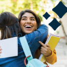 two young women celebrate college acceptance