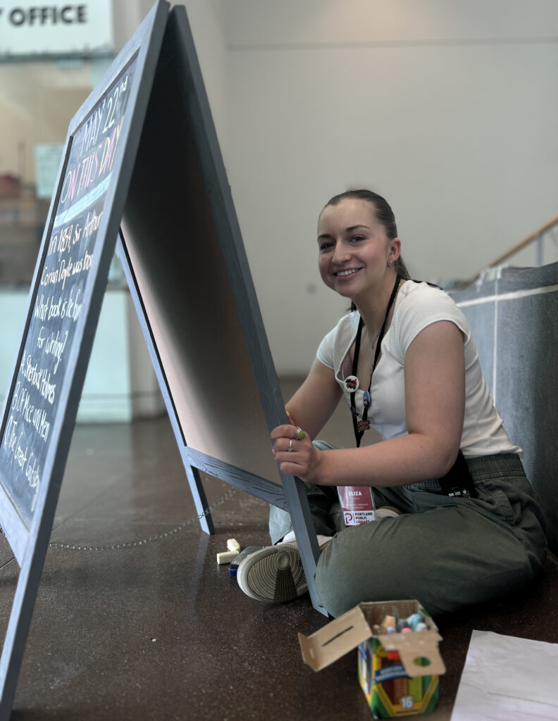 Eliza maintains the Downtown Library Trivia Board